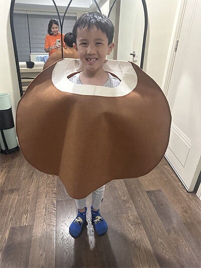 Little boy in a coconut costume for Buwan ng Wika.