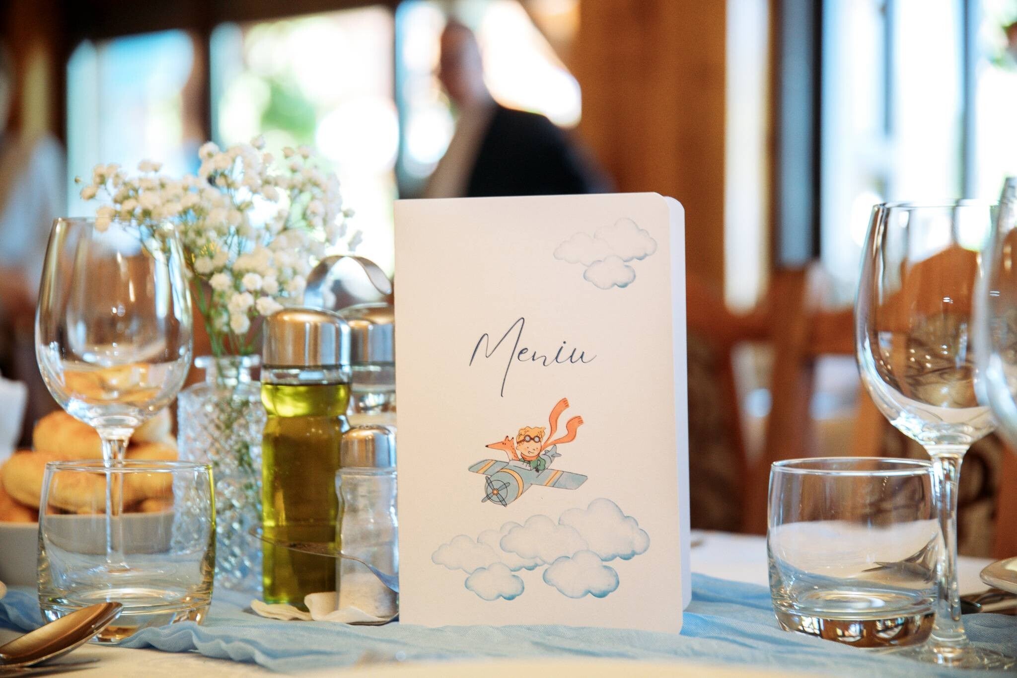 Creative baby boy baptism decoration on table.