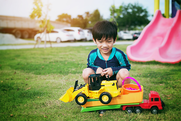 Kid playing in the backyard 