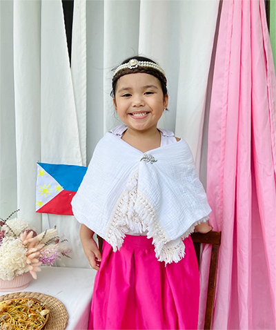 Little girl wearing Filipino costume for Buwan ng Wika. 
