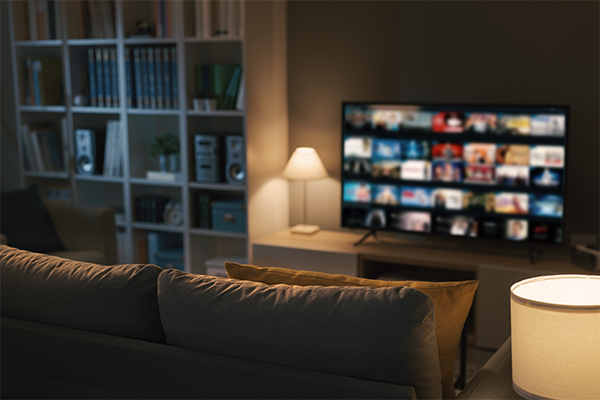 Photo of a living room interior and a streaming service on a smart TV