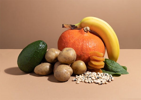 Potassium-rich food like avocados, potatoes, squash, bananas, dried apricots, and white beans