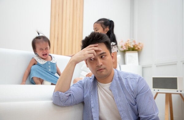Filipino father stays nearby and waits out his little daughter’s tantrum to help her emotional regulation. 