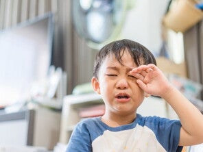 Young Asian boy crying Young Asian boy crying