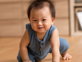 Healthy Asian baby crawl on their hands and knees on woomden floor. Healthy Asian baby crawl on their hands and knees on woomden floor.