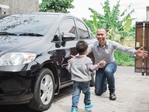 Asian toddler runs to his father, an OFW returning home for his annual leave Asian toddler runs to his father, an OFW returning home for his annual leave
