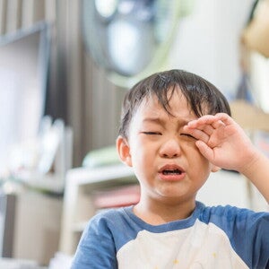 Young Asian boy crying Young Asian boy crying