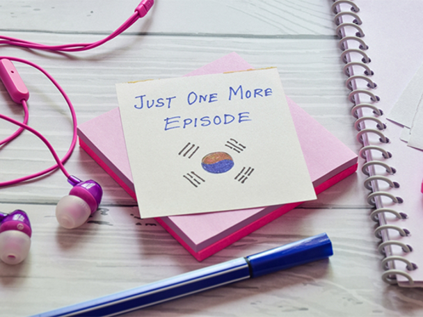 A Post-it note with the South Korean flag and the words "just one more episode