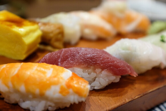 Raw fish and meat could make you more prone to food-borne illnesses. Close-up photo of sushi.